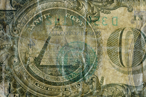 The Great Seal pyramid, highly magnified surface of used 1 dollar banknote with visible details of cotton fiber paper, with all flaws, watermarks and traces of usage.