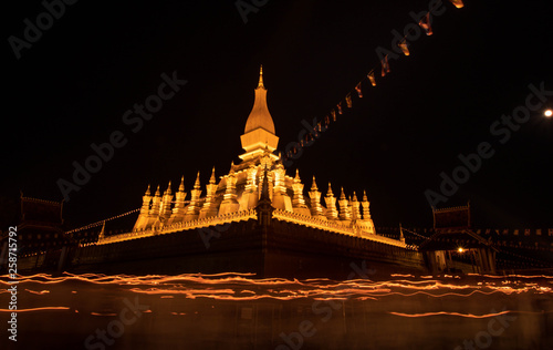 Phra That Luang (Golden Pagoda) at the candle light at night, Laos, Vientiane - Image