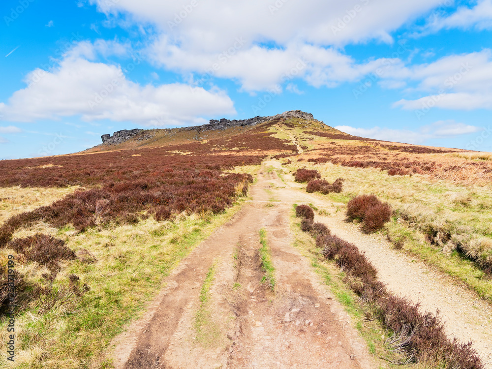 Over the moors to the gritstone cliffs of Higger Tor