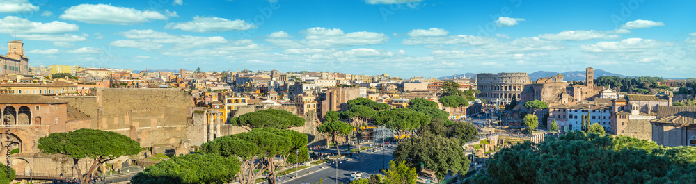 Scenic panorama of Rome with Colosseum and Roman Forum, Italy.
