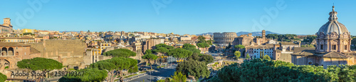 Scenic panorama of Rome with Colosseum and Roman Forum, Italy.