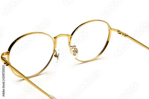 Golden border glasses on white background