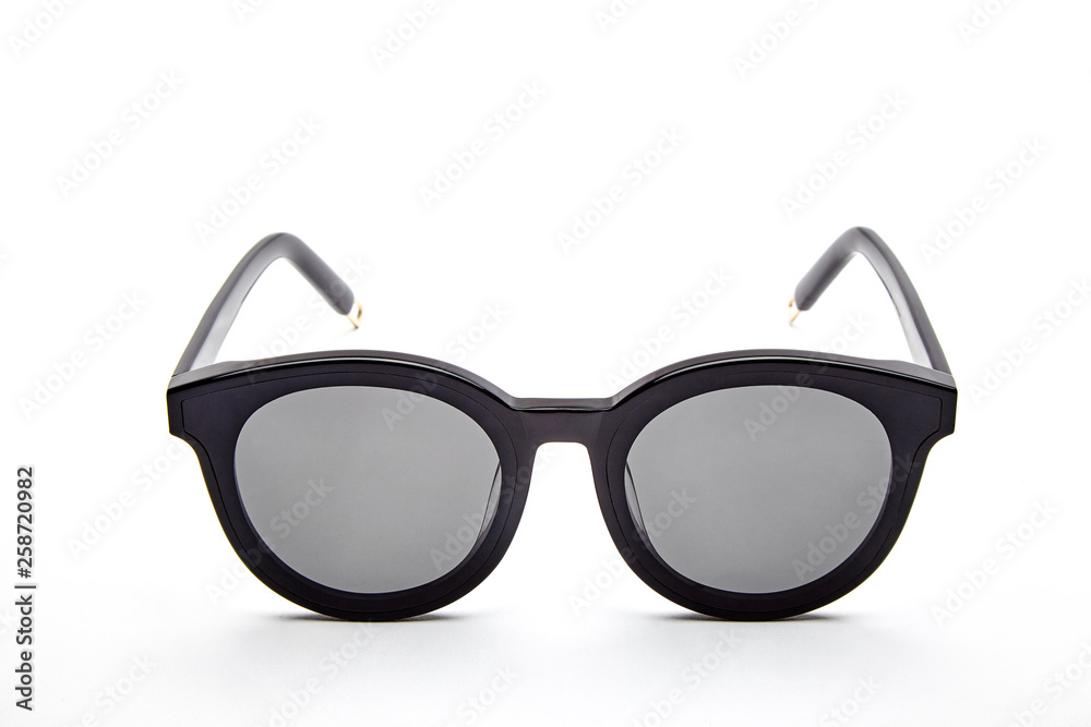 Black framed sunglasses on white background Black framed sunglasses on white background