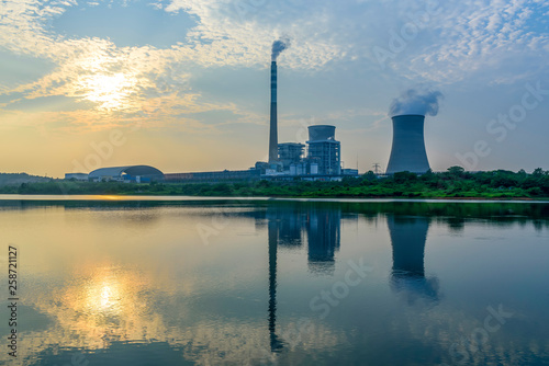 At dusk  the thermal power plants   tops of cooling towers of atomic power plant