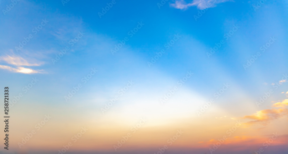 beautiful blue sunset sky with white clouds background, Nature background, yellow and orange tone.
