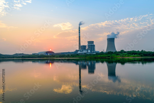 At dusk, the thermal power plants , tops of cooling towers of atomic power plant