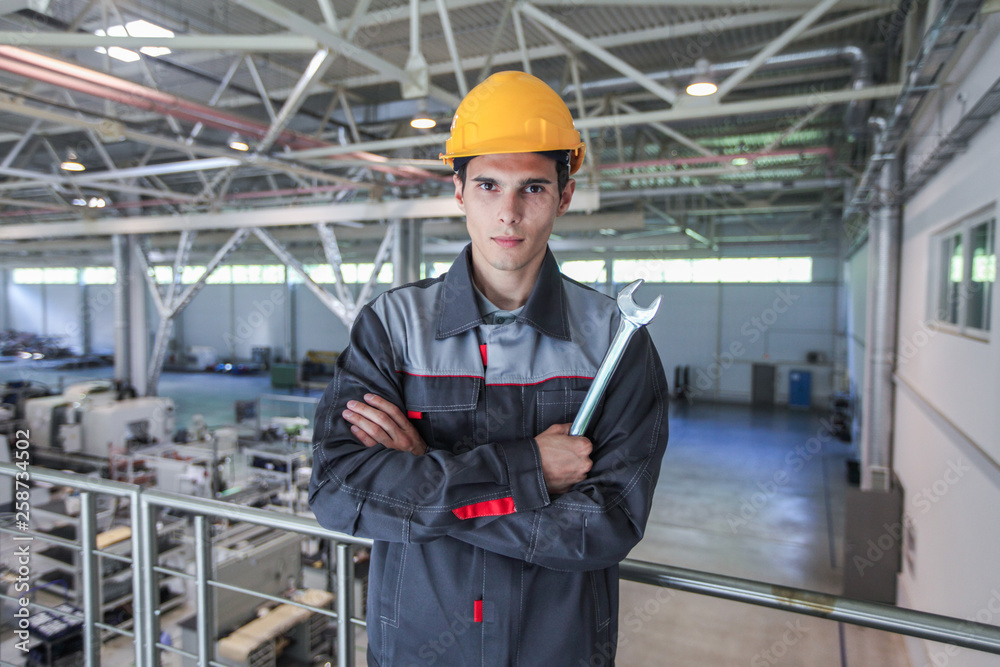 Young worker in hardhat Young worker in hardhat