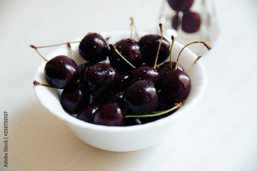 juicy dark cherries on a white background 1 juicy dark cherries on a white background 1