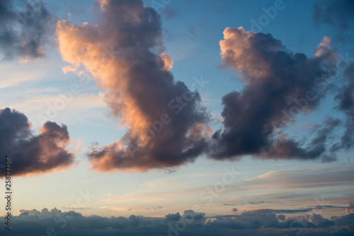 Beautiful colorful sky with clouds, view of the orange, blue, red and white sky, nature scenery, sunset
