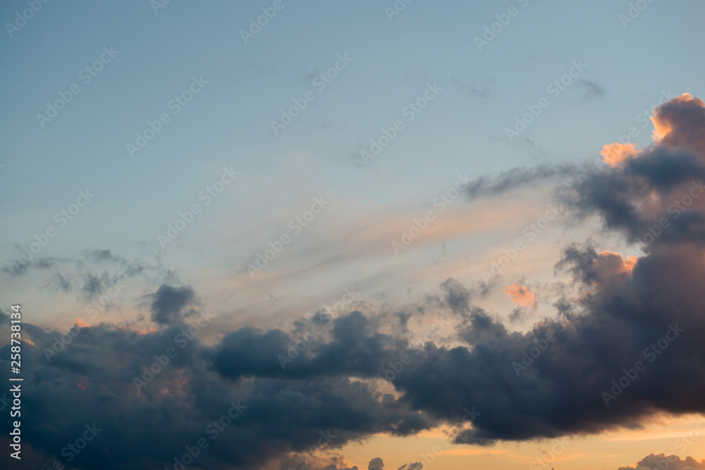 Beautiful colorful sky with clouds, view of the orange, blue, red and white sky, nature scenery, sunset