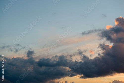 Beautiful colorful sky with clouds, view of the orange, blue, red and white sky, nature scenery, sunset