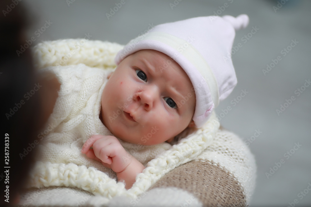 Baby newborn sleeping wrapped up in a blanket Baby newborn sleeping wrapped up in a blanket