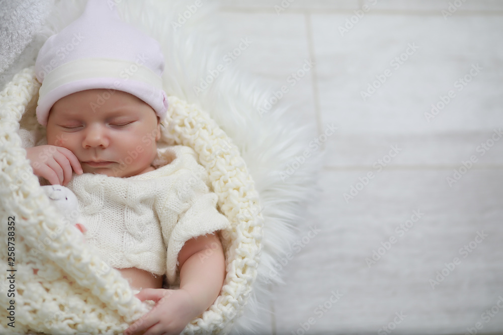 Baby newborn sleeping wrapped up in a blanket Baby newborn sleeping wrapped up in a blanket
