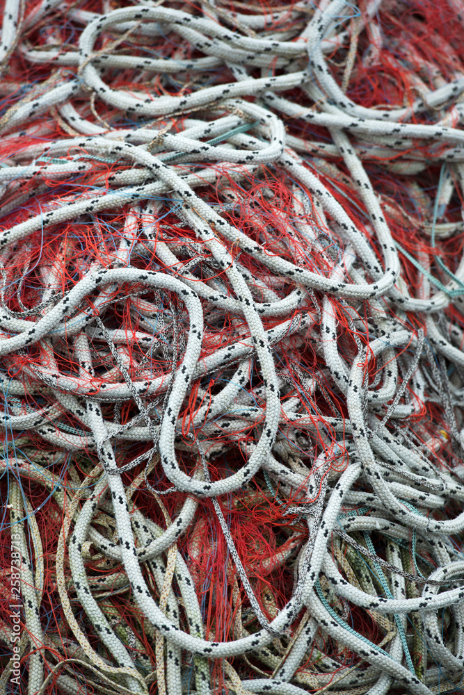 Rope with red fishing net for fish catching, fishing nets and ropes