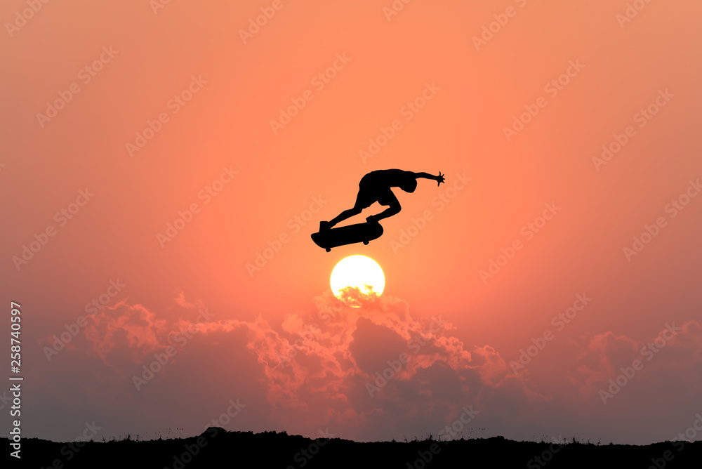 Silhouette of skateboarder young teenager man on sunset background. Silhouette of skateboarder young teenager man on sunset background.