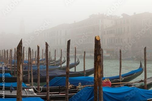 Gondolas on foggy Grand Canal
