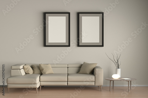 Posters in interior of living room with beige leather sofa, night lamp and branches in vase on wooden coffee table