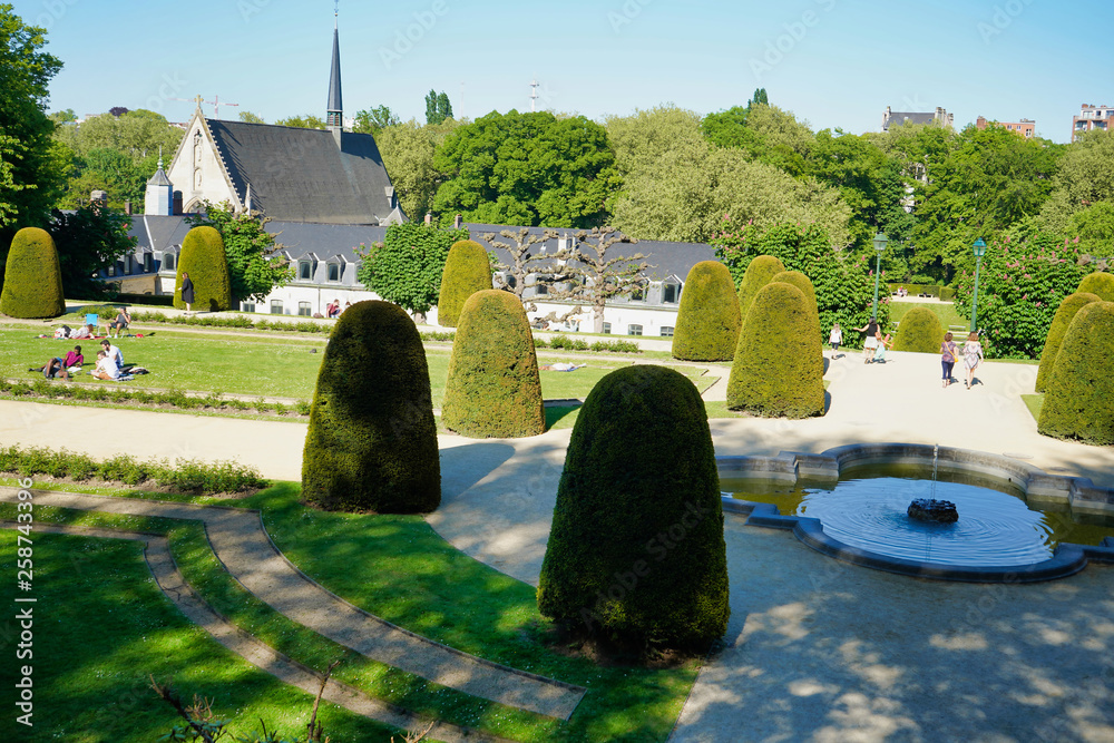 BRUSSELS, BELGIUM - MAY 6, 2018: Garden of Cumbre Abbey (Jardins de l'Abbaye de la Cambre). Park in the style of French classicism with green alleys and terraces