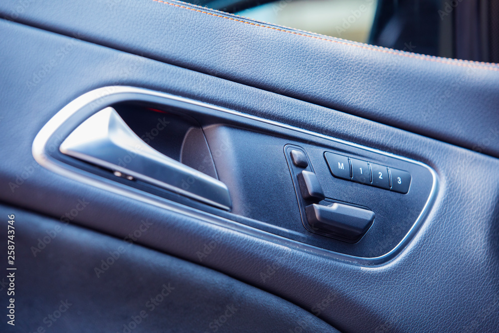 Door handle with Power window control,Door of the car with the lift of glass ,Modern cars and automation