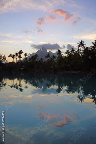 View of the Mont Otemanu mountain reflecting in water at sunset in Bora Bora  French Polynesia  South Pacific