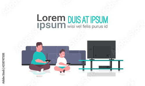 fat obese father with son holding joystick game pad overweight family plying video games on tv screen unhealthy lifestyle concept horizontal full length copy space