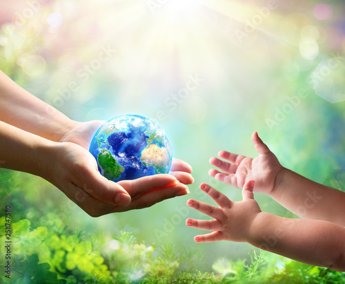 Mother Give Blue Earth In Daughter Hands - elements of this image furnished by NASA - 3d Rendering