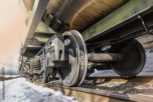 Close-up of train wheels. Bottom view. Winter