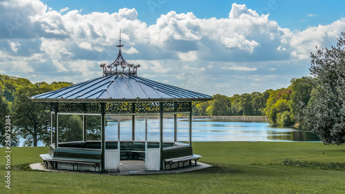 Obraz na plátně Victorian bandstand in Roundhay public park Leeds Yorkshire England with Waterloo Lake behind