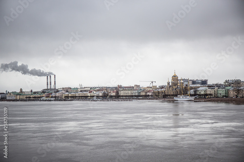 ice drift on the river at the industrial quarter in the port