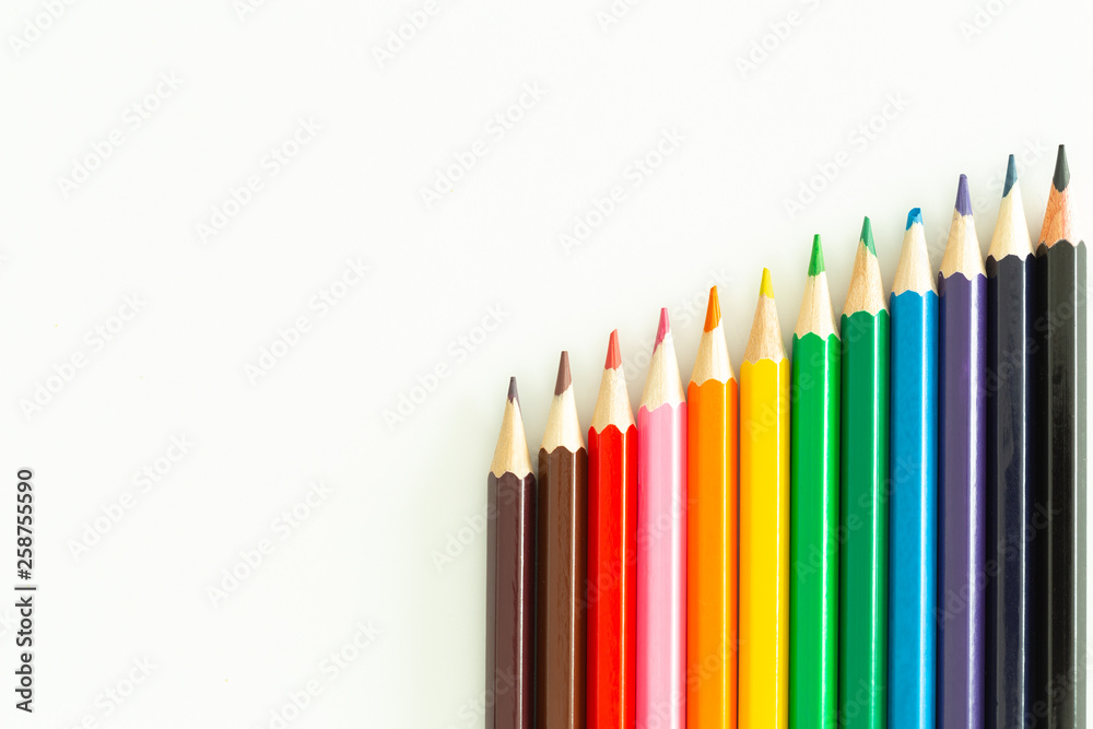 colored pencils on a white background