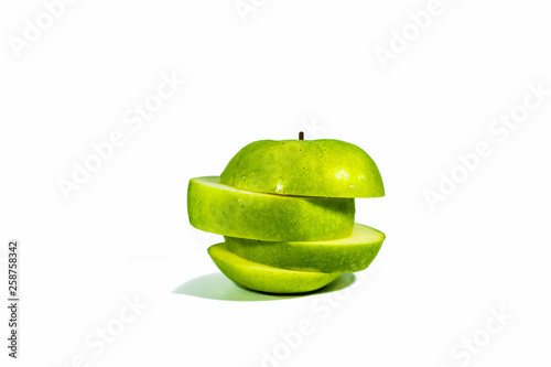 Wallpaper Mural Sliced green apples, stacked isolated on a white background Torontodigital.ca