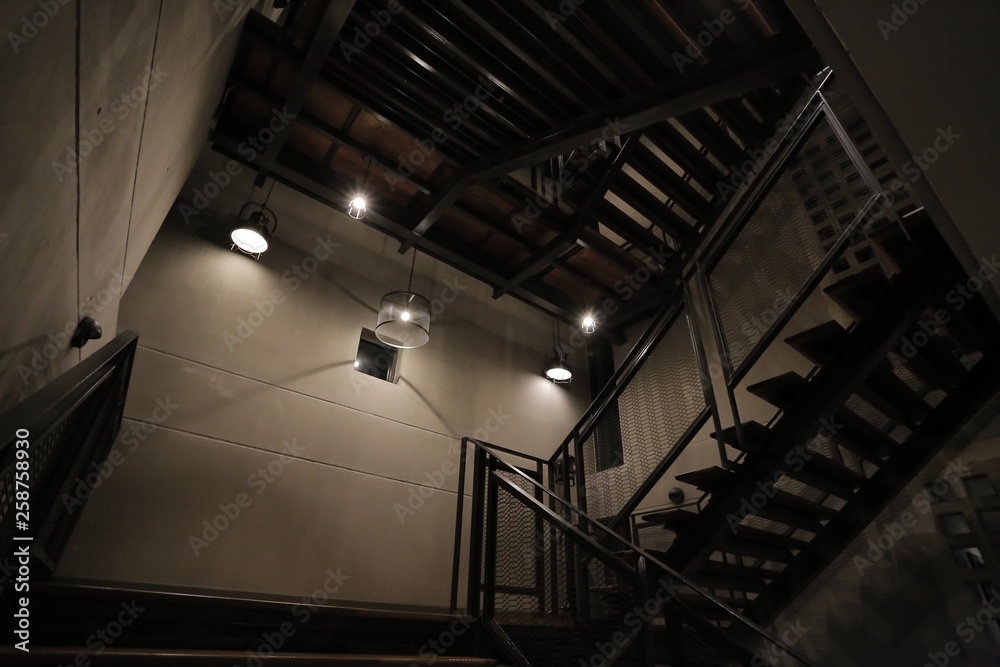 Fototapeta premium stair , iron staircase , lamp , Mysterious