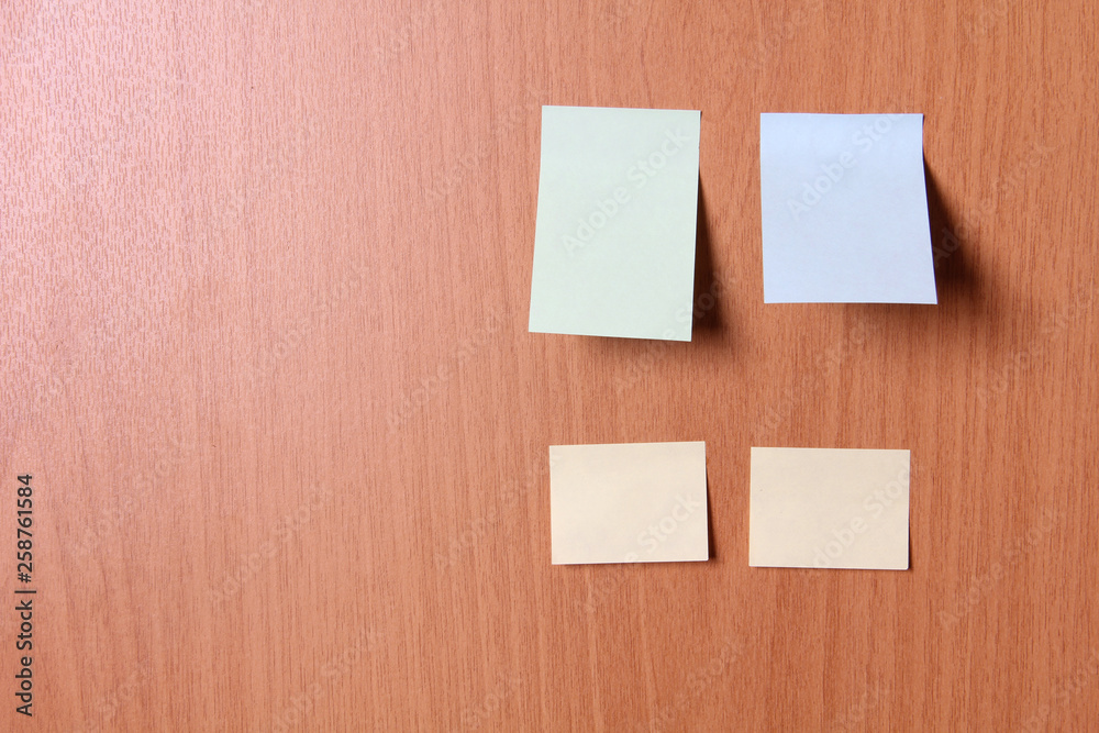 Sheets of paper on wooden background