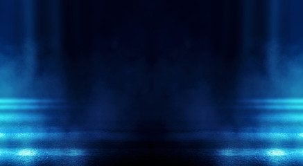 Background of empty dark room with rays of light. Concrete floor with light reflection. Smoke, neon blue light