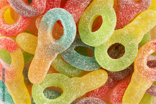 Fruit flavored key jelly candies. Top view of a macro photography. photo