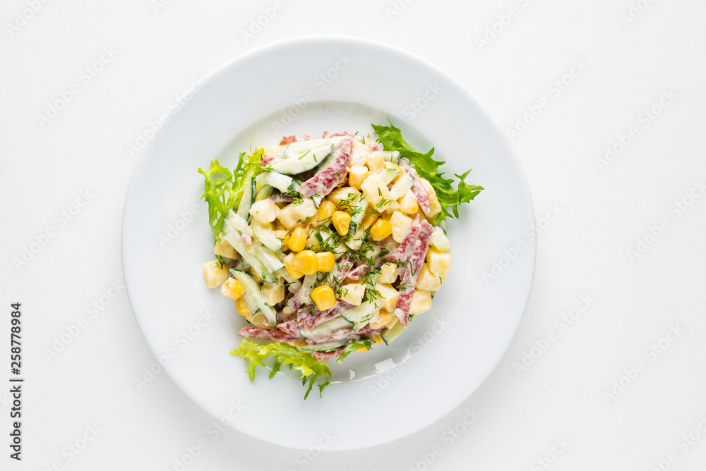 salad with corn on the white plate salad with corn on the white plate