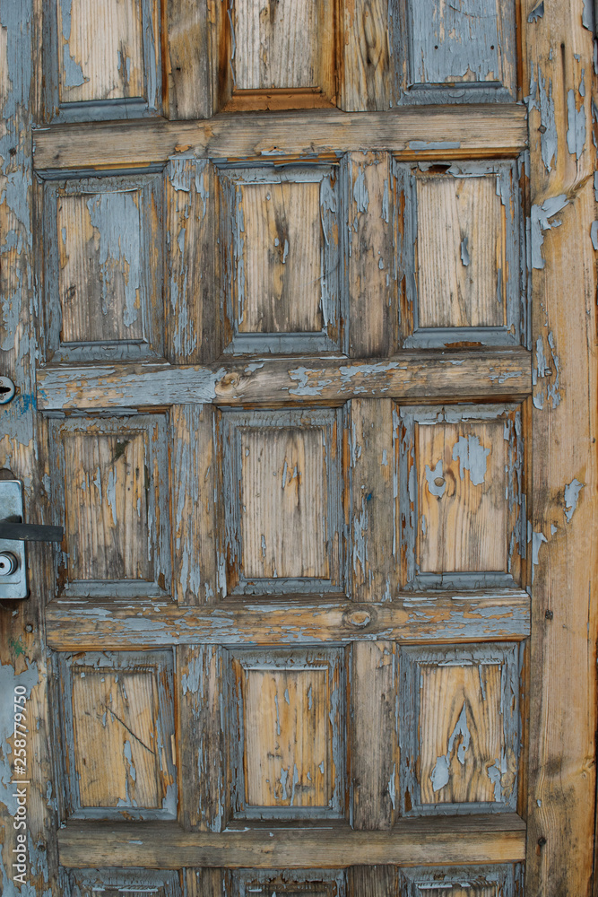 .Texture of the old door. Peeling paint, peeling. Background. .Texture of the old door. Peeling paint, peeling. Background.