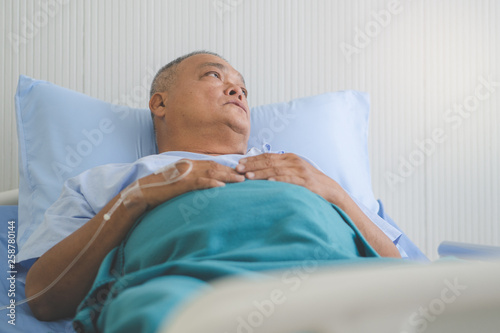Asian elderly on the bed in hospital.
