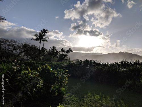 Sunset through clouds over Hanalei bay © Eric BVD