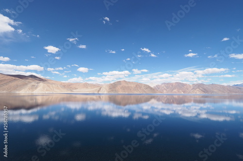 Reflection of mountain in the lake .Beautiful landscapes of Pangong  lake as a background. © Sasaton