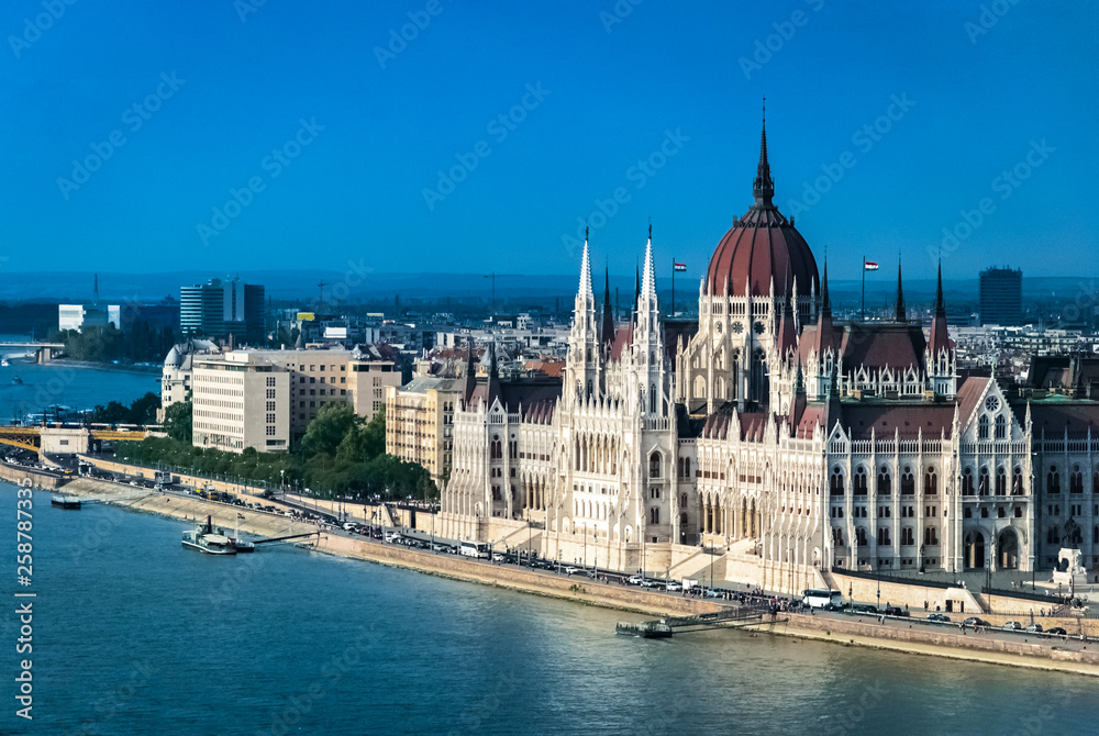 View of Parliament building in Budapest, Hungary from the opposite bank of the Danube View of Parliament building in Budapest, Hungary from the opposite bank of the Danube