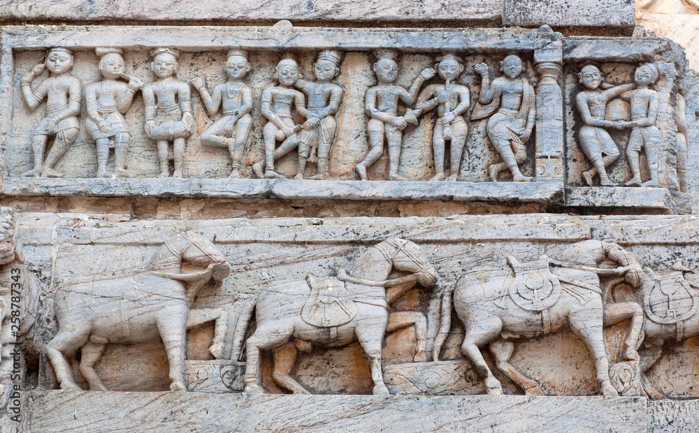 Bas-relief at famous ancient Jagdish Temple in Udaipur, Rajasthan, India