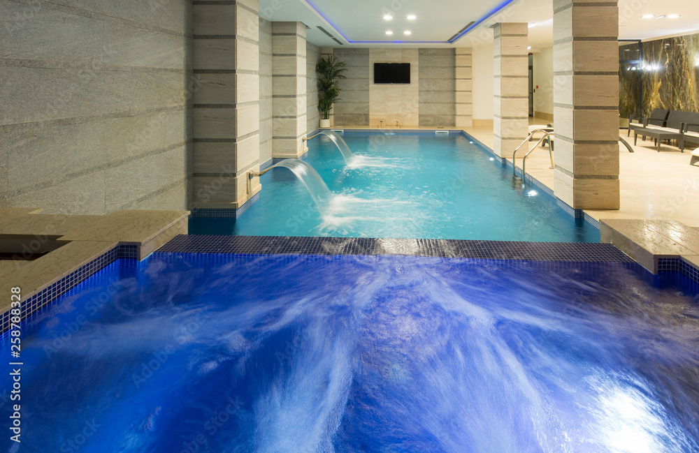 Swimming pool in hotel spa and wellness center