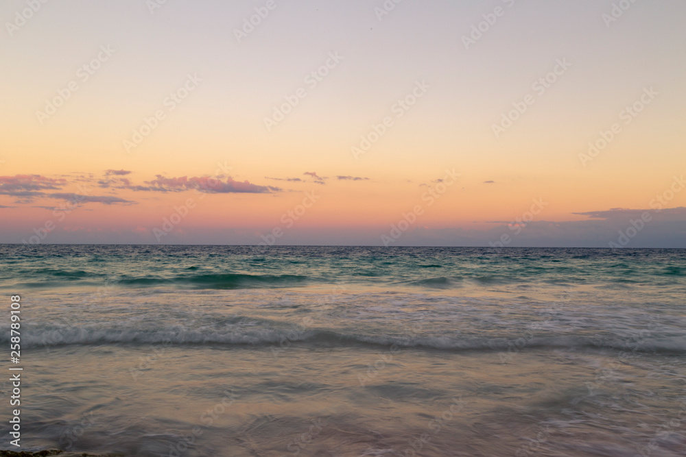 Sunrise over the beach of the Mayan Riviera in Tulum, Quintana Roo, Mexico