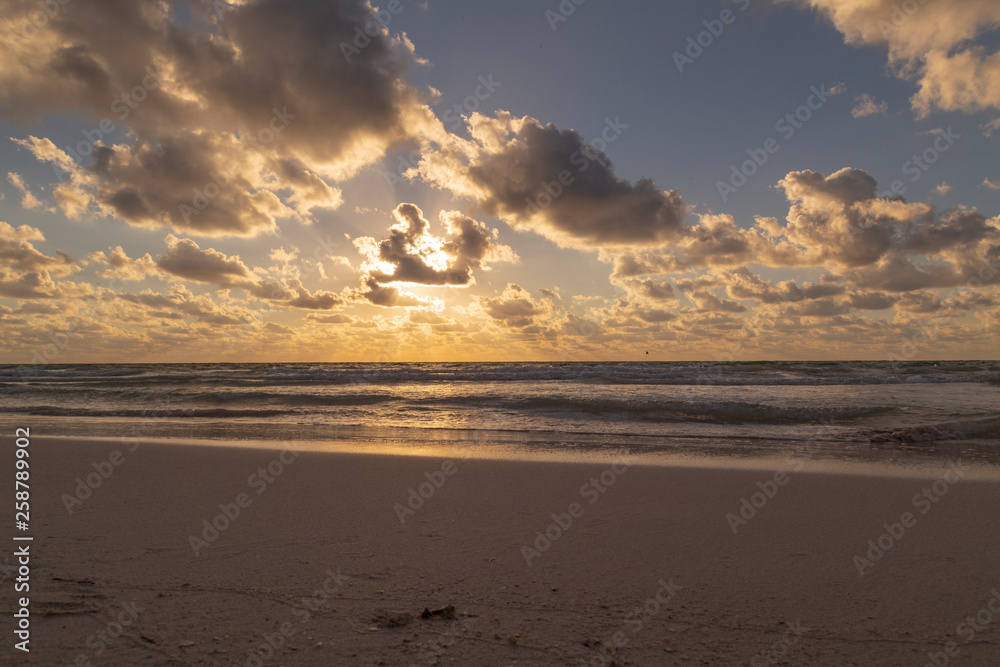 Obraz premium Sunset over the beach of the Mayan Riviera in Tulum, Quintana Roo, Mexico