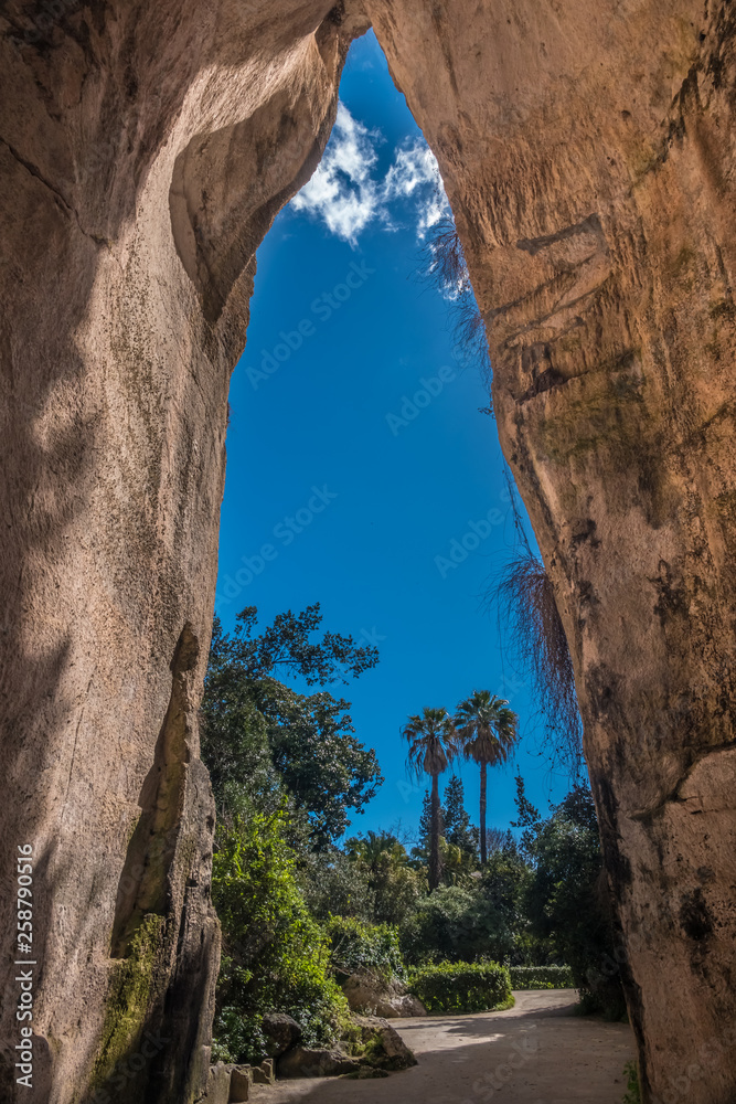 Fototapeta premium The Ear of Dionysius (Orecchio di Dionisio) a limestone cave carved in ancient times in Syracuse (Siracusa), Sicily, Italy. 