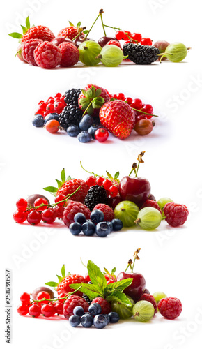 Set of fresh fruits and berries isolated a white. Ripe currants, raspberries, cherries, strawberries, gooseberries, mulberries and bilberries. Background of mix fruits with copy space for text.