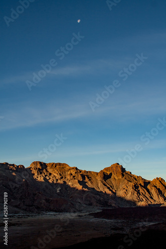 far view to mountain formation with a moon © Elosoblues