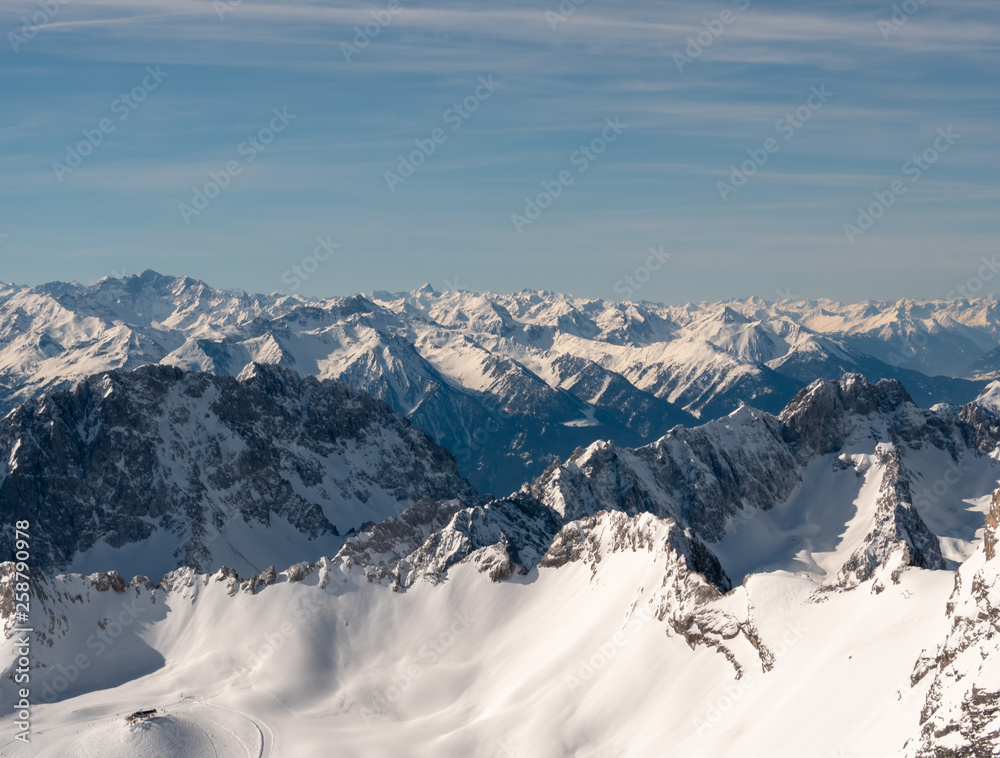 View from the German Zugspitze across the top of a snow mountain landscape