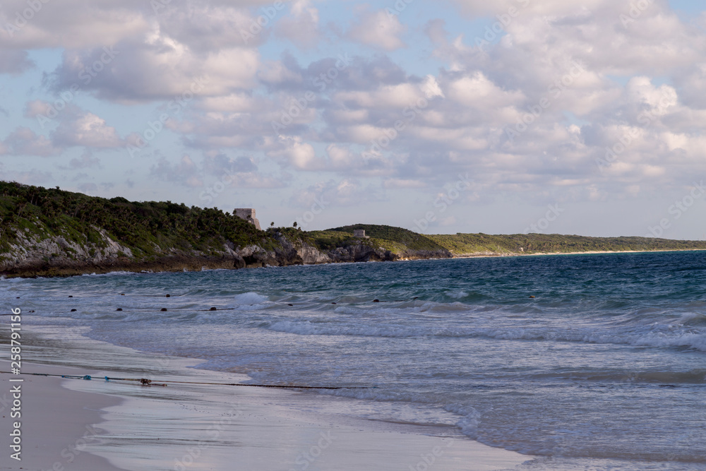 Fototapeta premium Sunset over the beach of the Mayan Riviera in Tulum, Quintana Roo, Mexico